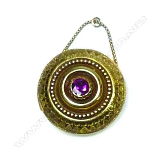 A Victorian Etruscan 15ct. yellow gold target brooch