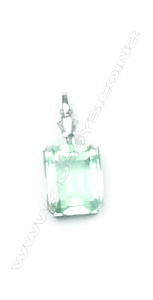 An 18ct white gold aquamarine and diamond pendant Image 1++