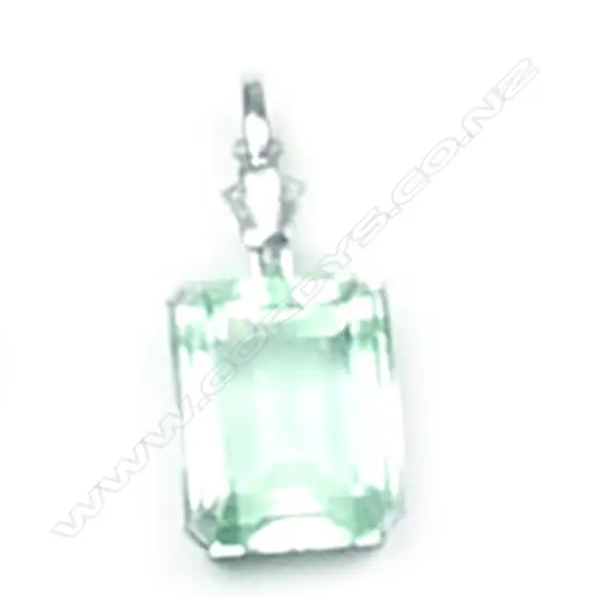An 18ct white gold aquamarine and diamond pendant