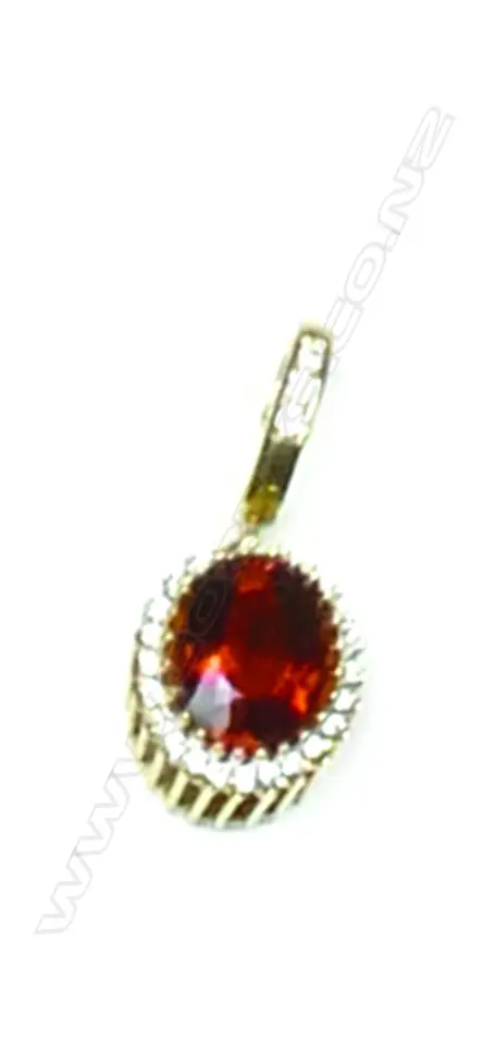 An 18ct. yellow gold citrine and diamond pendant Image 1++