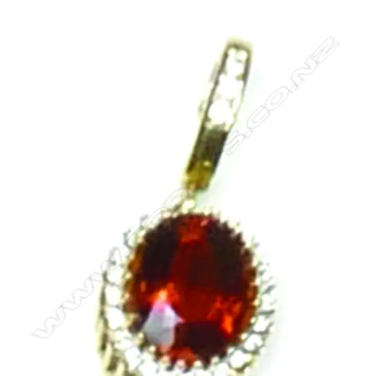 An 18ct. yellow gold citrine and diamond pendant