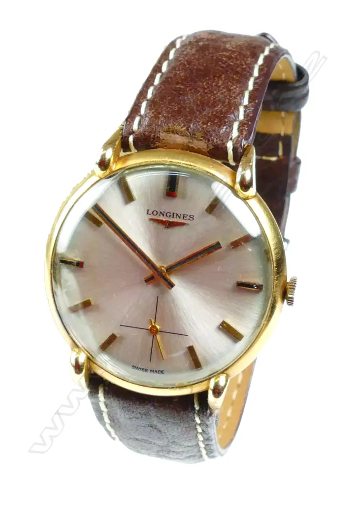 A gent's 1960s Longines 18ct. yellow gold cased wristwatch Image 1++