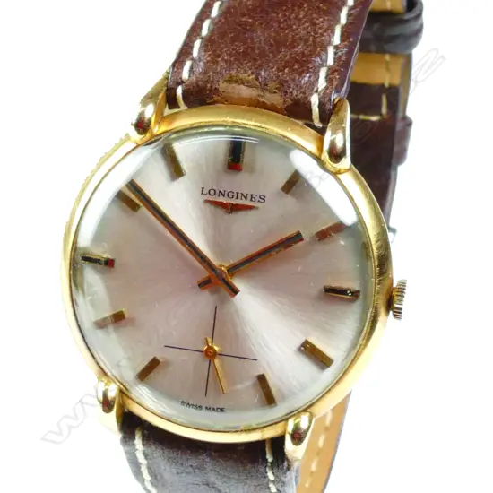 A gent's 1960s Longines 18ct. yellow gold cased wristwatch