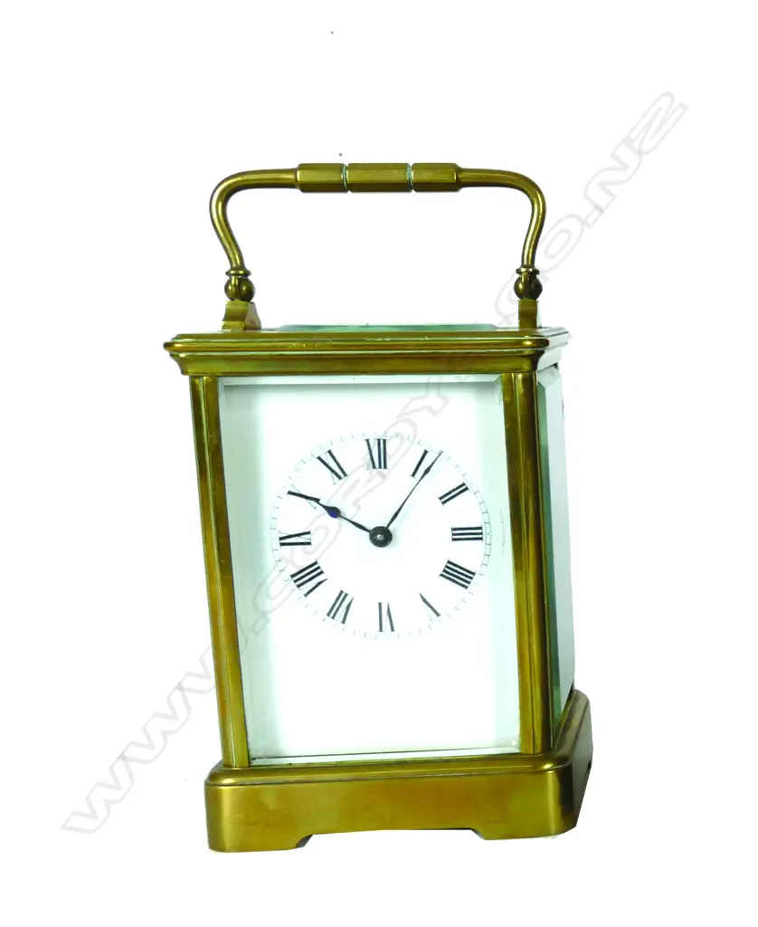 A brass cased carriage clock Image 1++