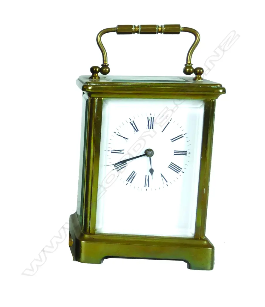 A small French brass cased carriage clock Image 1++
