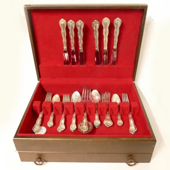A set of American six place Gorham sterling silver cutlery with scroll handles