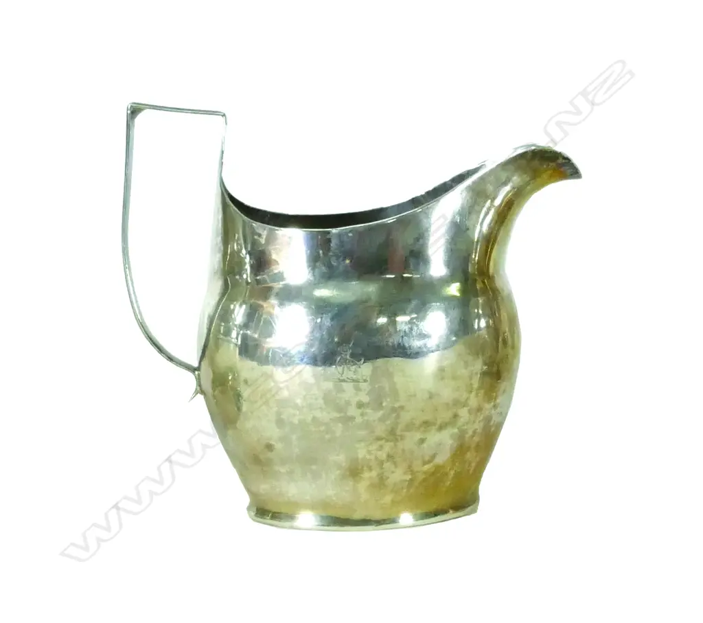 A George III silver flat bottomed helmet cream jug Image 1++