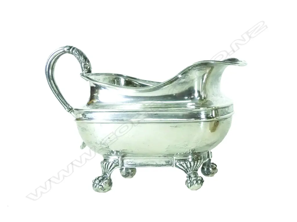 A heavy silver cream jug of Regency style Image 1++