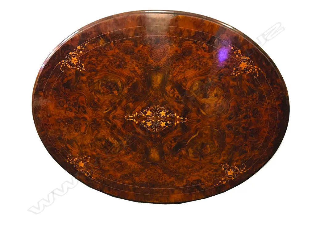 A good quality Victorian figured walnut oval loo table Image 1++