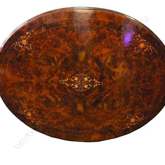 A good quality Victorian figured walnut oval loo table