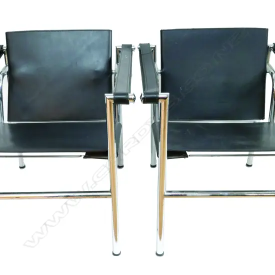 A pair of reproduction Le Corbusier Basculant Sling Chairs