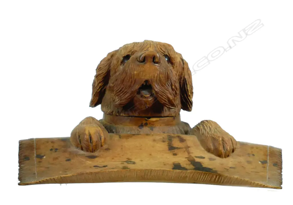 An antique 'Black Forest' carved fruitwood inkwell modelled as a dog Image 1++