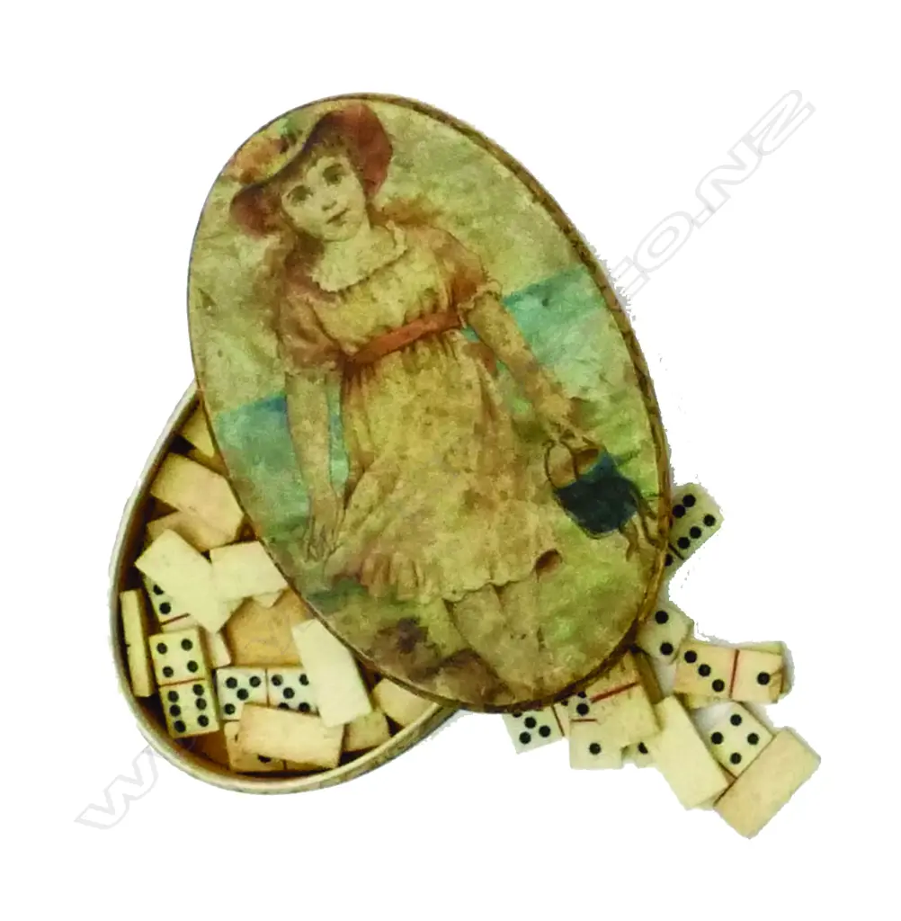 A 19thC small carved bone travelling domino set in decorative 19thC card case Image 1++