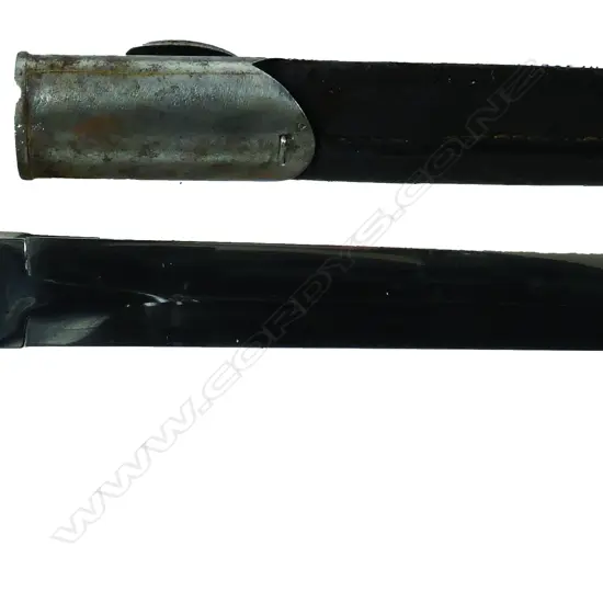 A bayonet knife with a unique carved antler handle