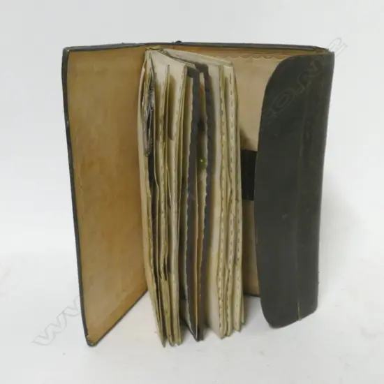 A late Victorian large brown leather fly wallet with flies