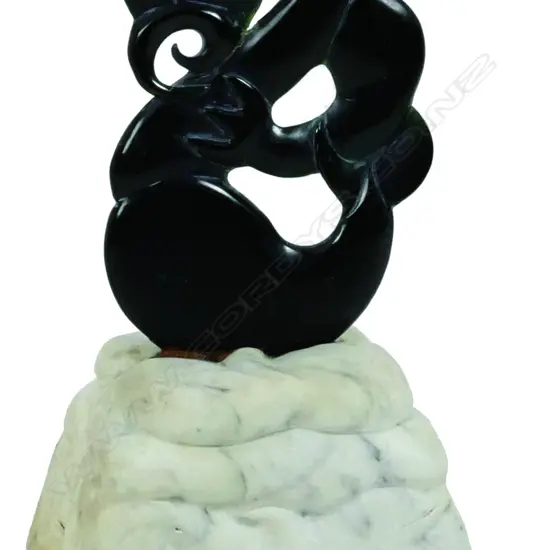 A well carved N.Z. greenstone (nephrite) Taniwha sculpture by Steven Gwaliasi
