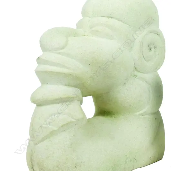 A modern sandstone carved canoe figure head