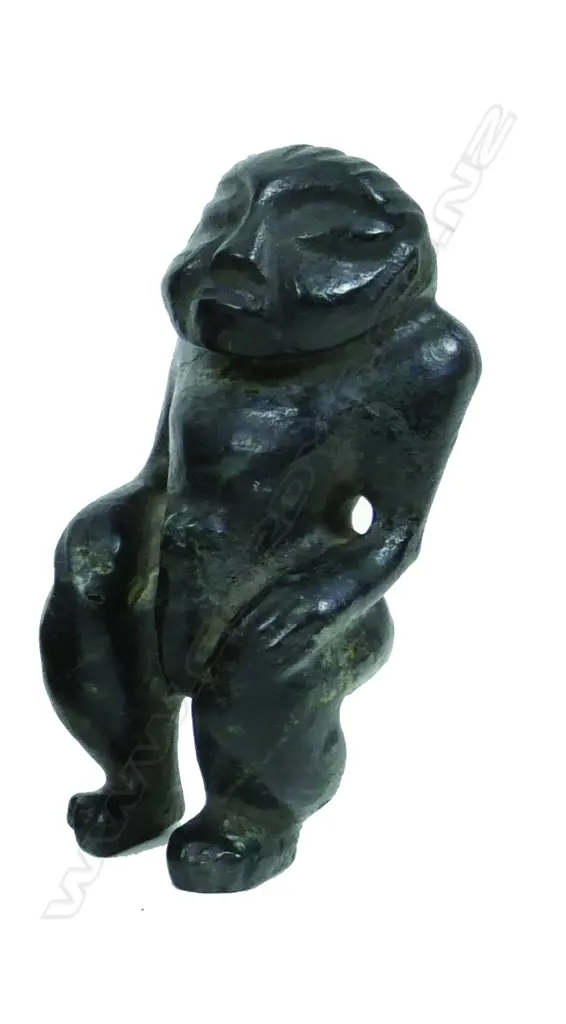 A sculptural stone carved figure Image 1++