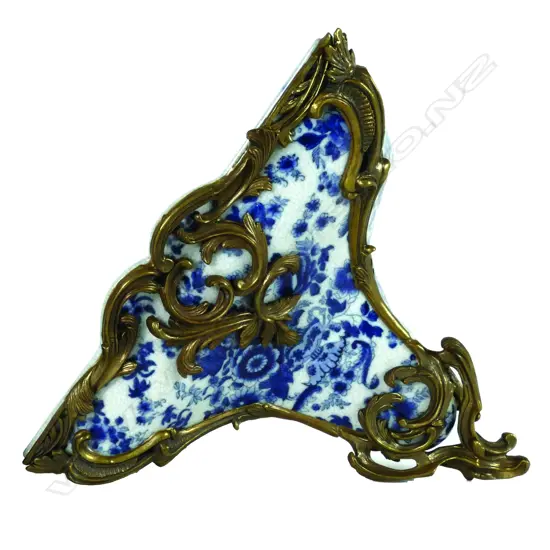 A pair of German porcelain wall sconces