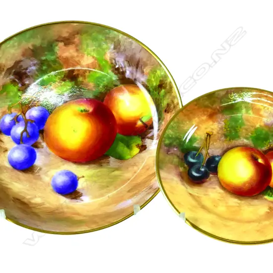 A small Royal Worcester fruit painted saucer dish signed Maybury