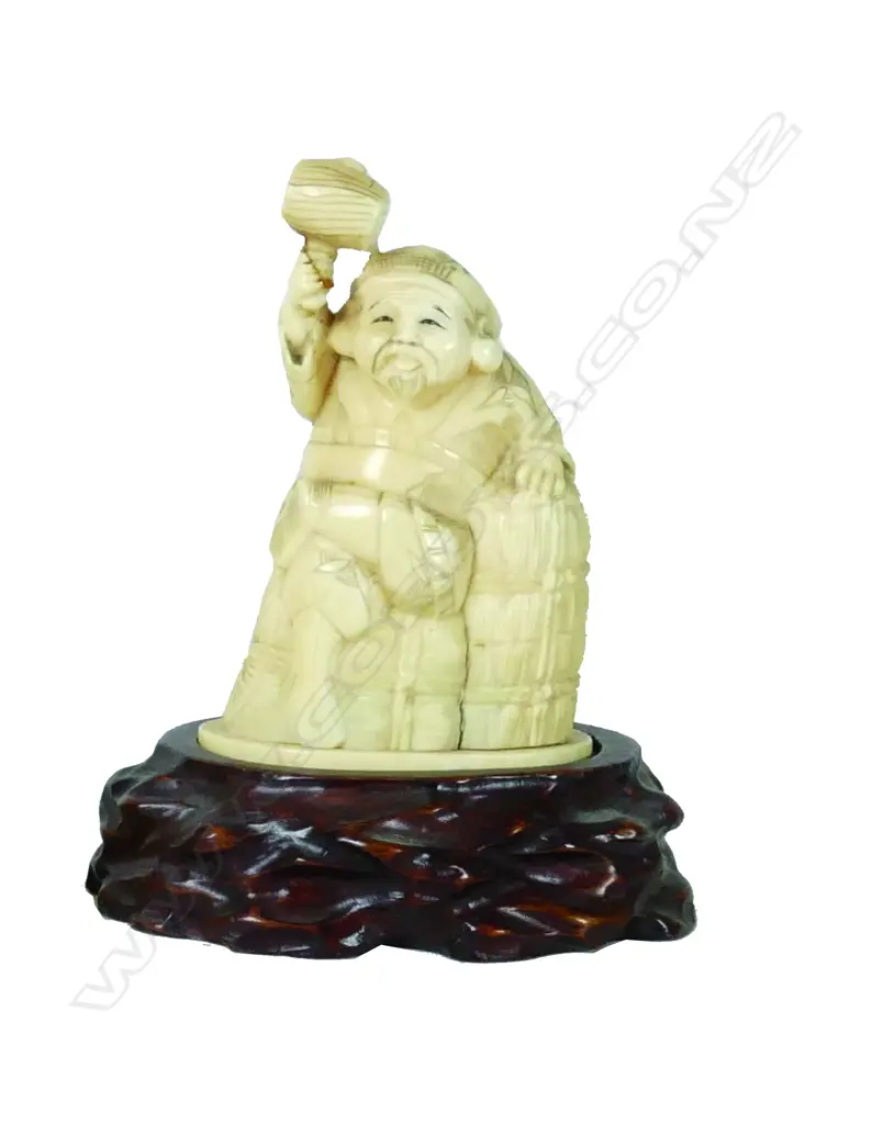 A Japanese ivory carving of Daikoku Image 1++