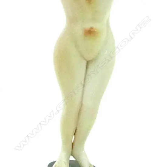 A Chinese carved ivory medicine doll