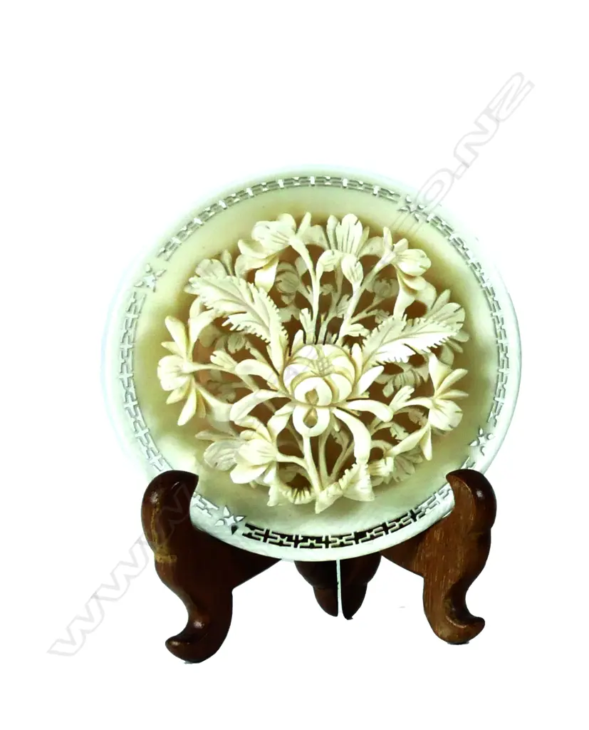 A small finely carved ivory plaque Image 1++