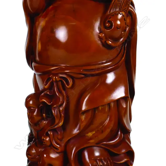 A Chinese finely carved Hang Yang wood figure of a standing Buddha