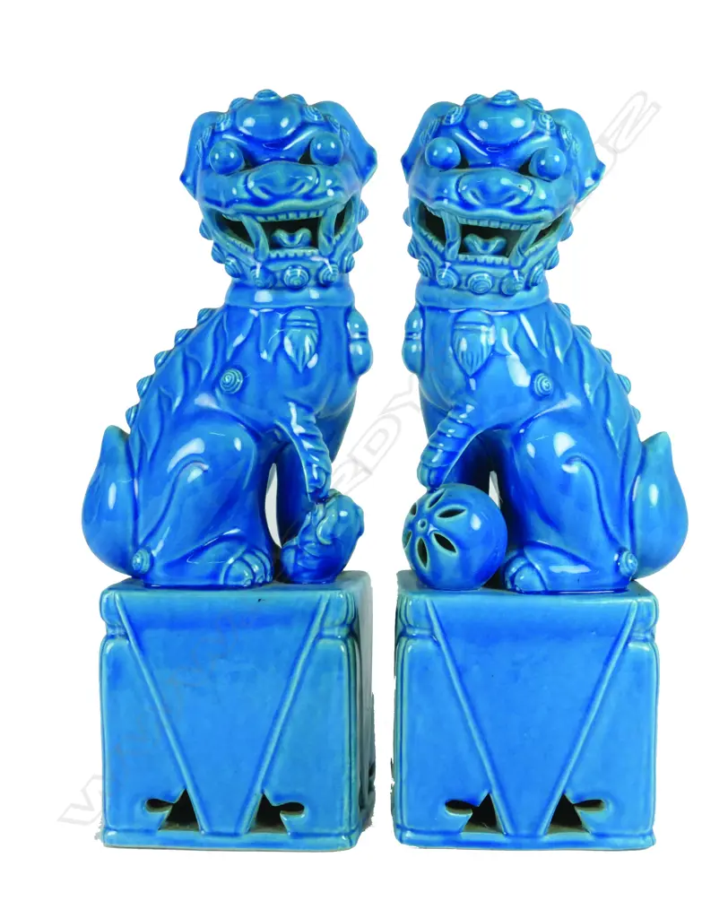 A pair of Chinese turquoise glazed lion dogs Image 1++