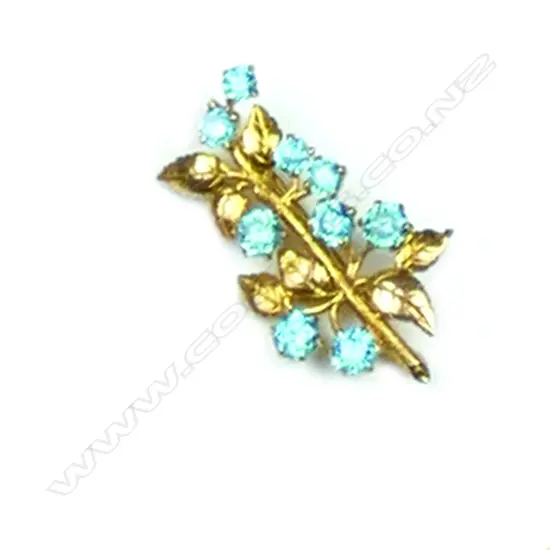 A 9ct gold and blue zircon brooch