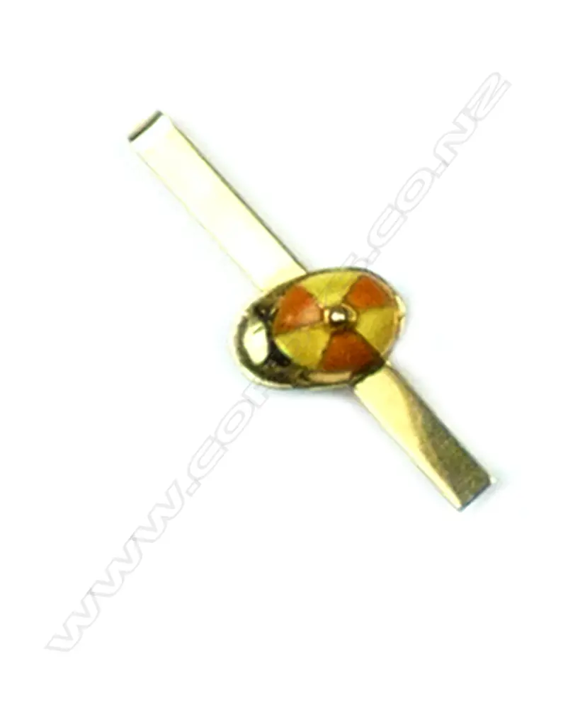 A 14ct gold and enamel jockey cap clip Image 1++