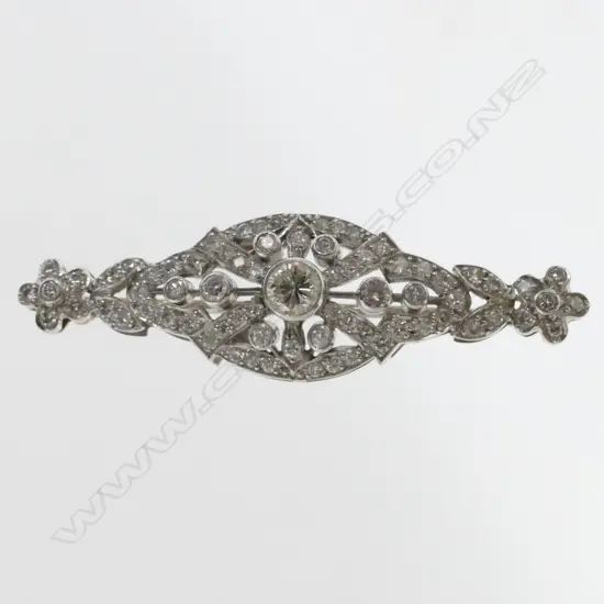 An Edwardian Belle Epoque style 18ct. white gold and diamond brooch