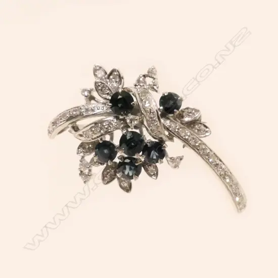 An elegant 14ct. white gold spray brooch