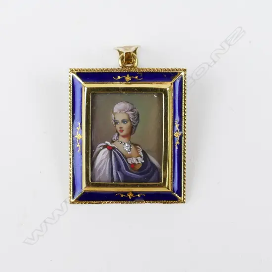 An Italian 18ct. yellow gold framed hand painted portrait miniature locket