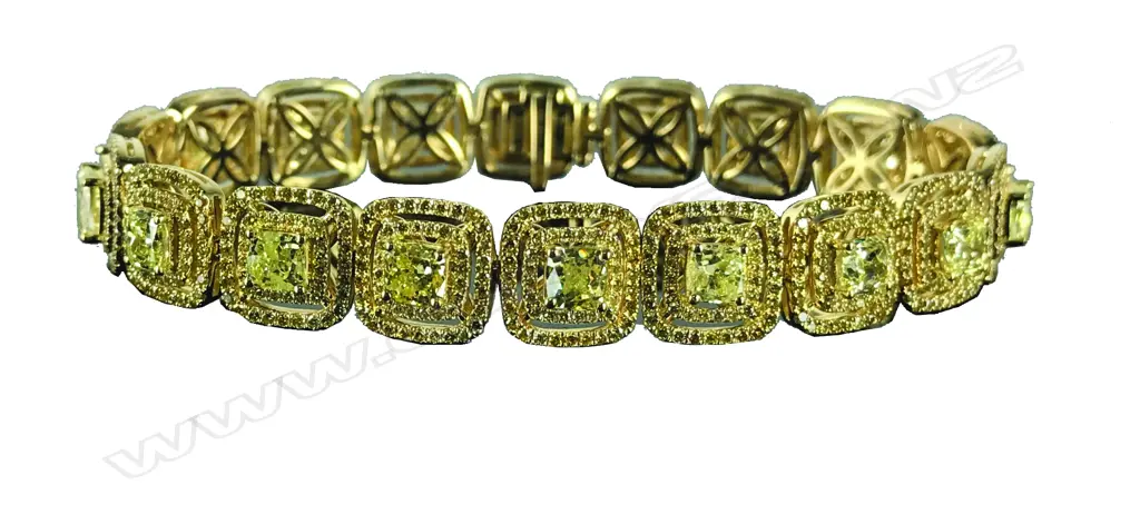 An impressive fancy yellow multi-diamond and 18ct. yellow gold bracelet Image 1++