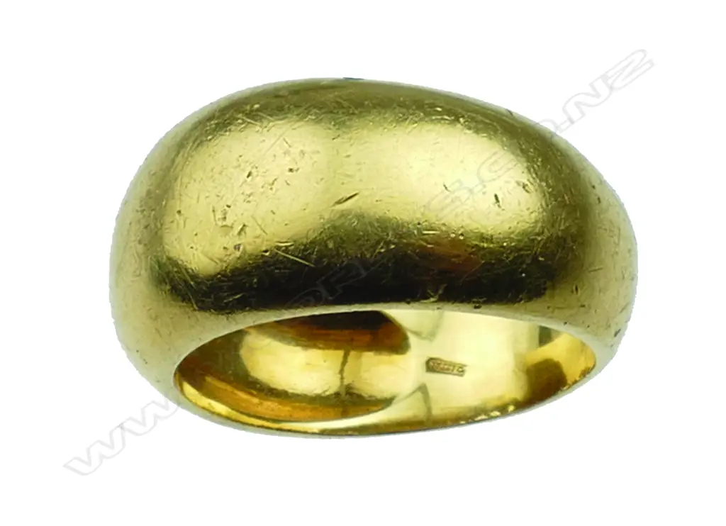 An 18ct. yellow gold wide domed band ring Image 1++