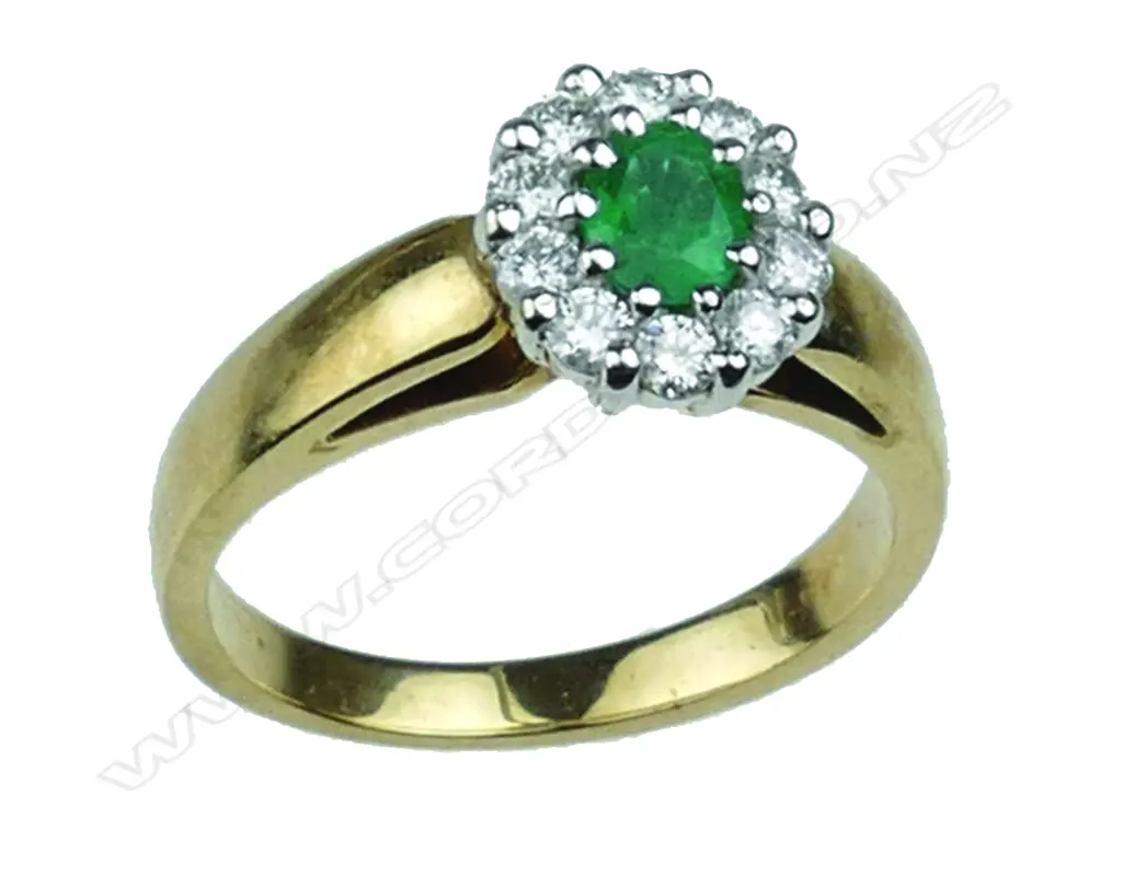 A lady's estate 9ct. yellow and white gold emerald and diamond ring Image 1++