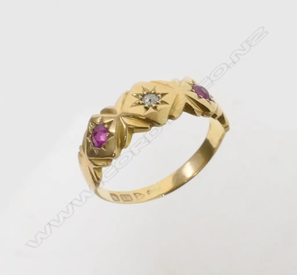 An 18ct. yellow gold ruby and diamond ring Image 1++
