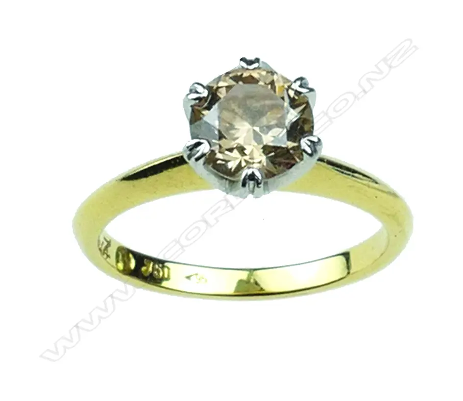 An 18ct. gold and diamond solitaire ring Image 1++
