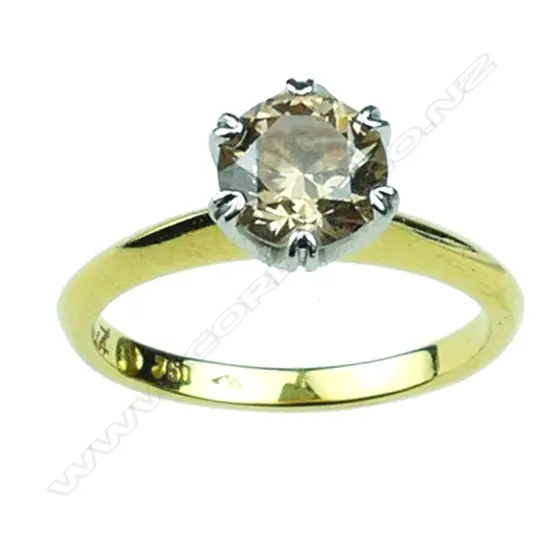 An 18ct. gold and diamond solitaire ring