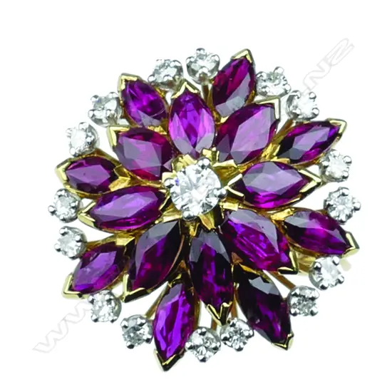 An impressive 18ct gold ruby and diamond princess ring