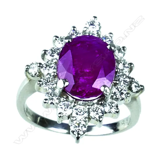 A vintage ladys' platinum ruby and diamond cluster ring