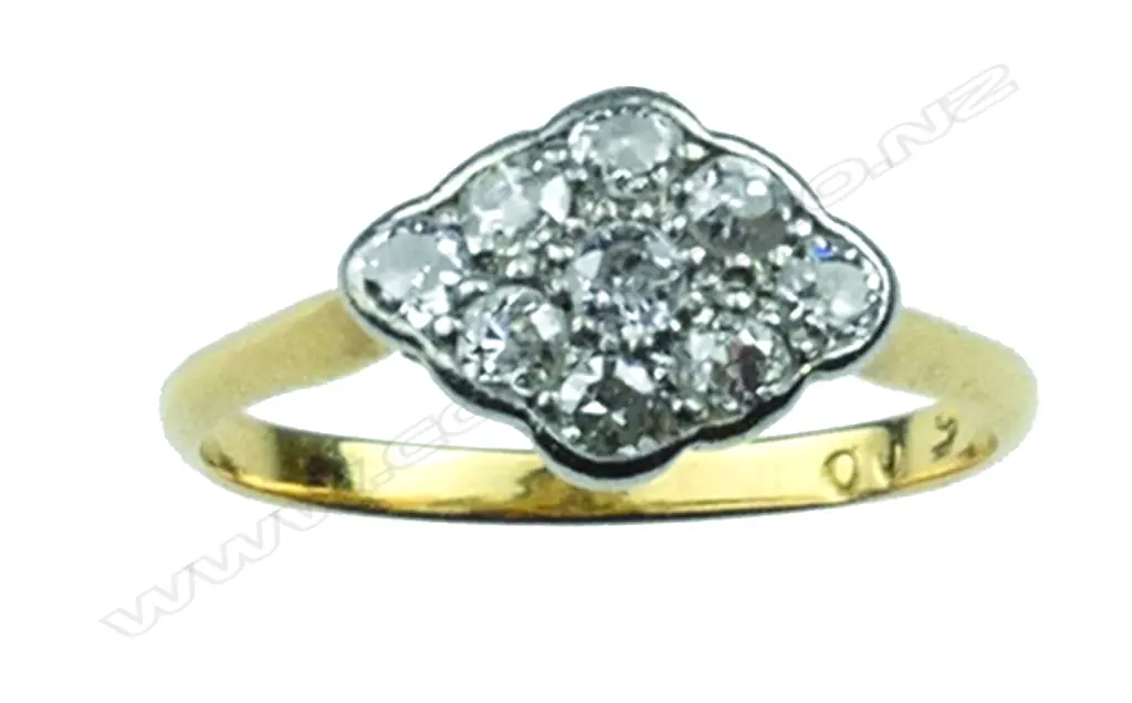 An Art Deco 18ct. and diamond cluster ring Image 1++