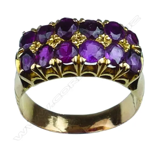 A vintage lady's 14ct. yellow gold and ruby cluster ring