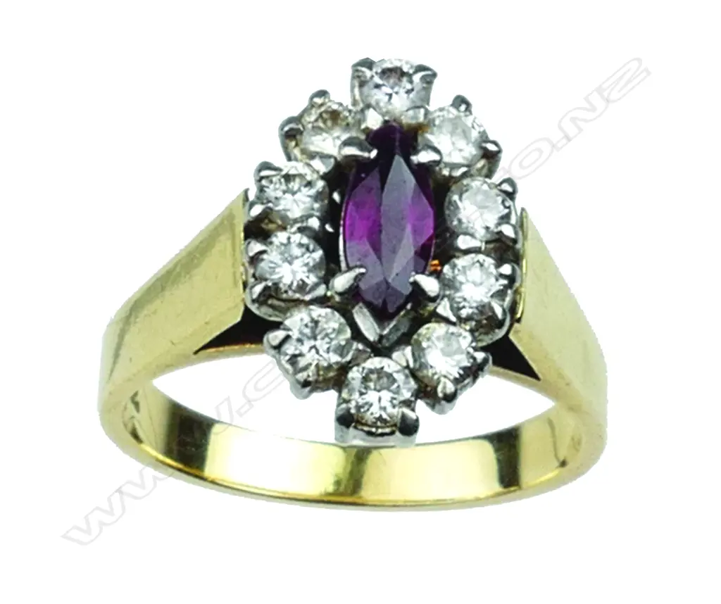 A vintage lady's 18ct. ruby and diamond cluster ring Image 1++