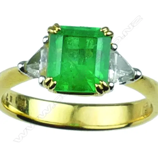 A vintage lady's 18ct. yellow gold emerald and diamond ring