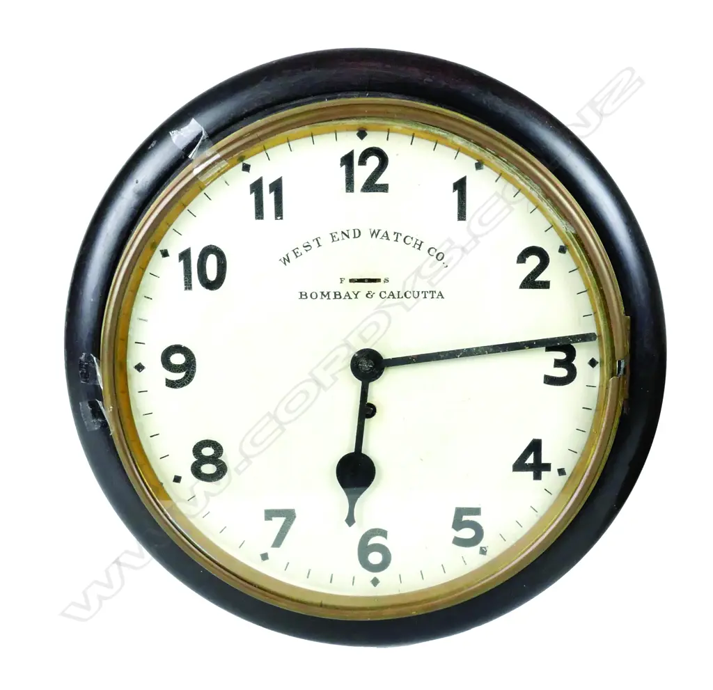 An old wood-cased school clock with brass bezel and Arabic numerals. Diameter 370. West End Watch Co. Image 1++