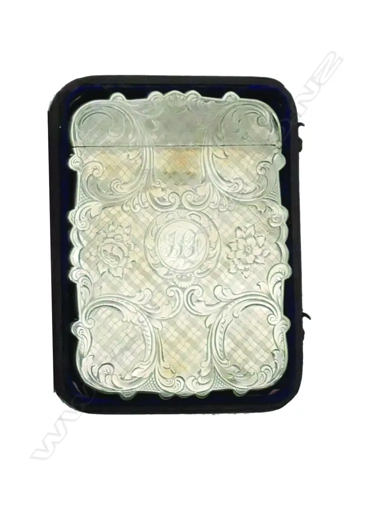 A Victorian finely engraved silver card case in original fitted leather case Image 1++