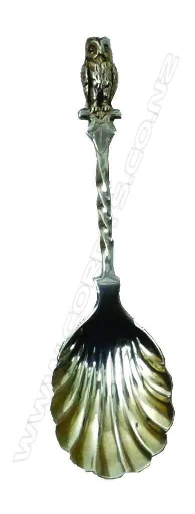 A Victorian silver caddy spoon with cast owl finial Image 1++