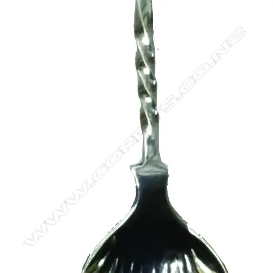 A Victorian silver caddy spoon with cast owl finial